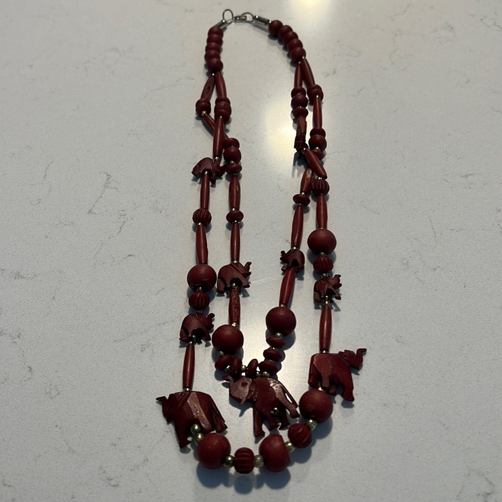 Red wood elephant necklace